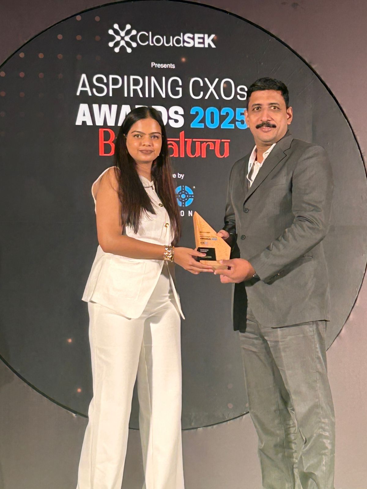Varghese Chacko receiving the Aspiring CXOs Award 2025, Bengaluru, presented by CloudSEK